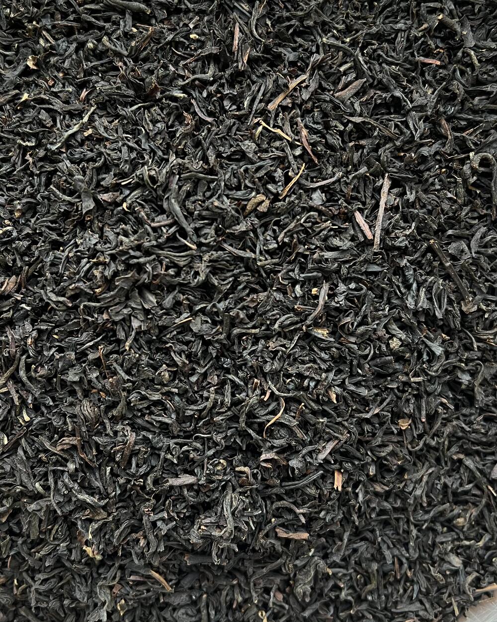 Loose-leaf organically grown Australian tea, spread out before brewing.